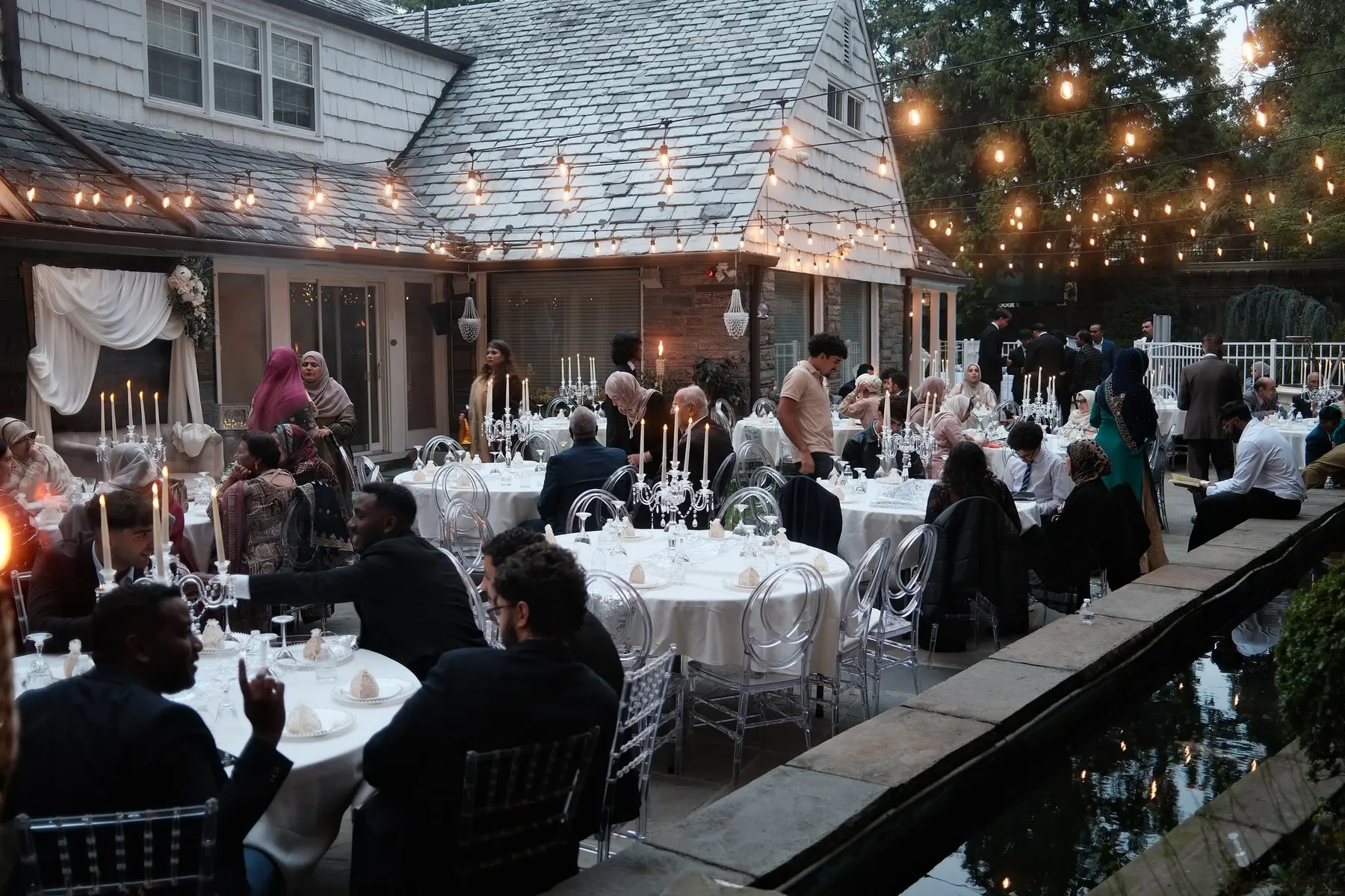 Garden reception under string lights