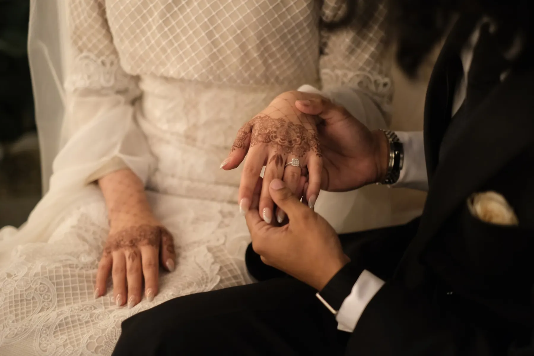 Henna hands held